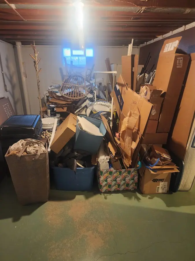 Roll-off dumpster container at job site for Concrete Dumpster Rental in Belle Haven